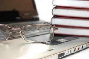Laptop, Glasses, Books